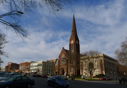 Historic Northampton streetscape with the prominent church steeple, representing local accommodations.